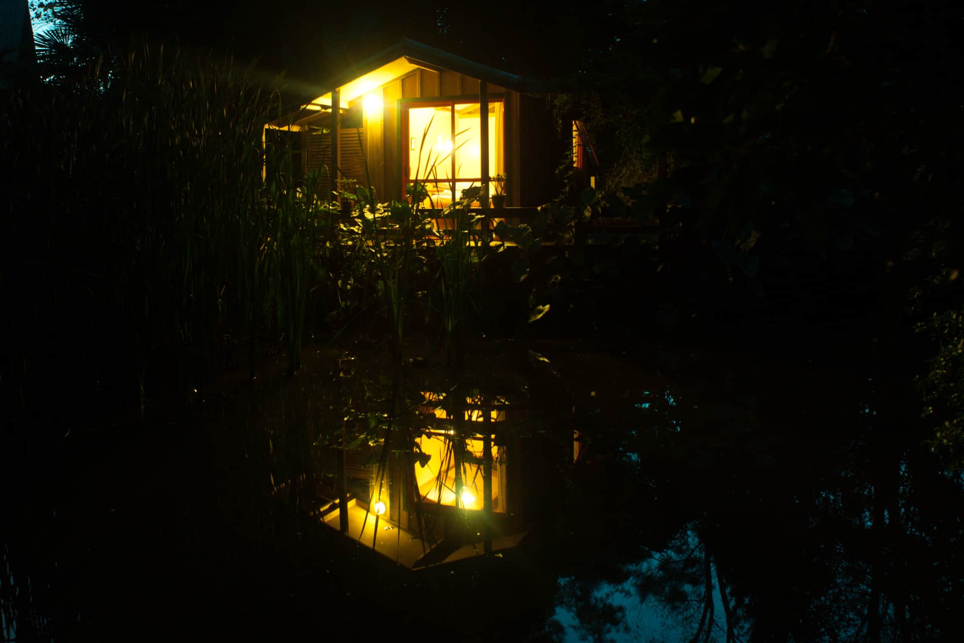 Pond Cabin exterior view at night